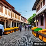 필리핀 비간시 유네스코 문화유산 - A vibrant street scene in Vigan’s historic district featuring cobblestone pathways lined with tradit...